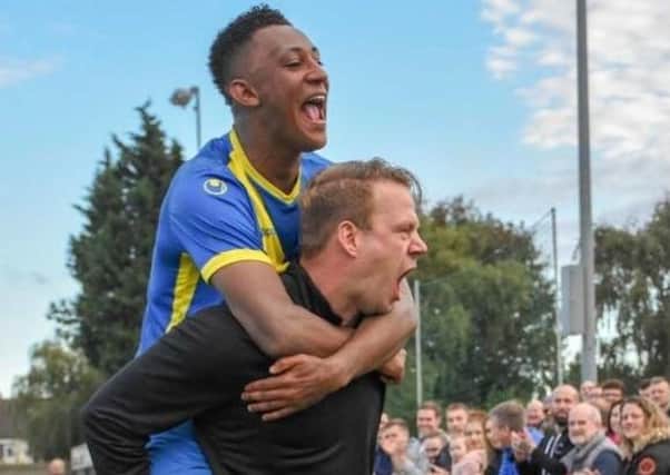 Peterborough Sports manager Jimmy Dean and star player Dion Sembie-Ferris. Photo: James Richardson.