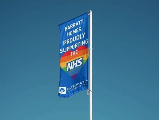 A Barratt Homes flag at one of its developments showing support for the NHS
