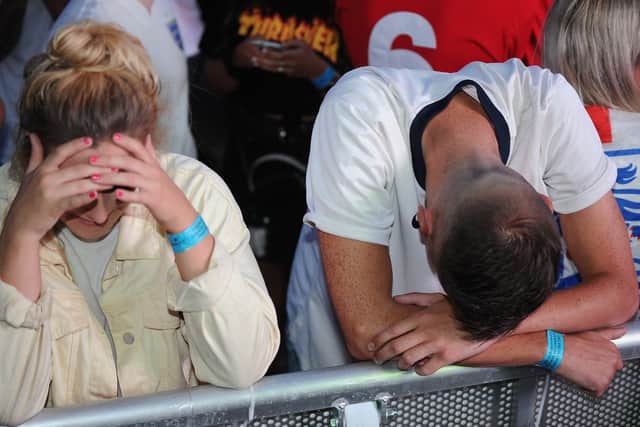 Disappointed football fans.