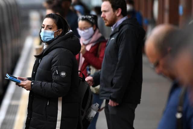Don't forget to wear your mask on trains and in stations from Monday (Photo by DANIEL LEAL-OLIVAS/AFP via Getty Images)