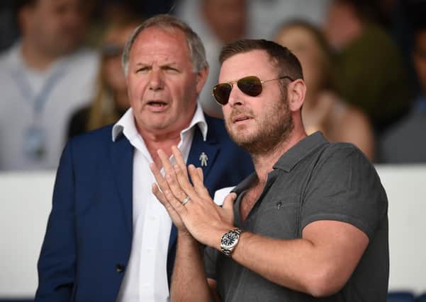 Posh chairman Darragh MacAnthony (right) with director of football Barry Fry.
