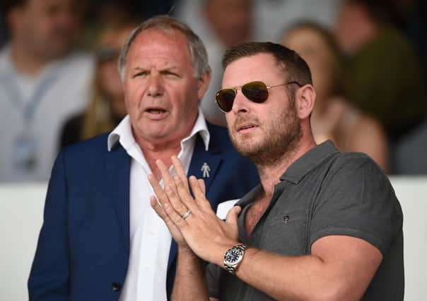 Posh chairman Darragh MacAnthony, right, with director of football Barry Fry. Photo by Michael Regan/Getty Images.