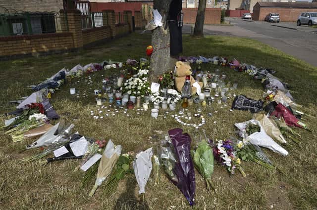 Tributes left in Tilton Court