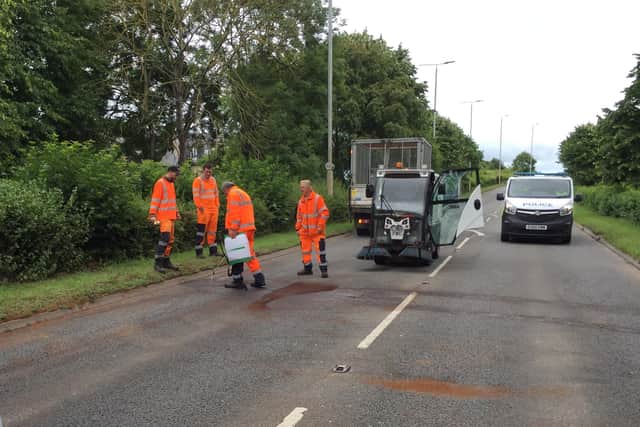 The road being cleared in Boongate this morning after a collison in which two people were injured.
