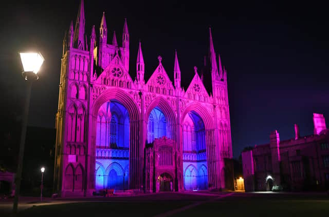 Peterborough Cathedral lit in pink and blue EMN-211010-211616009