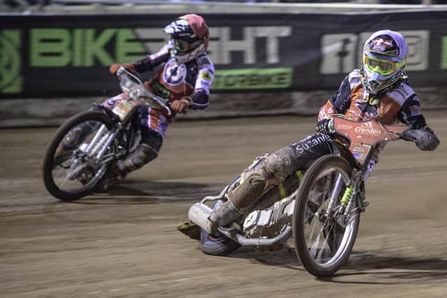 Peterboough Panthers rider 
Michael Palm Toft (white helmet) and Dan Bewley of Belle Vue. Photo: Ian Charles/MI News.