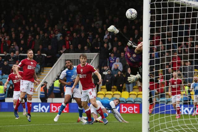 Sammie Szmodics (kneeling) scores his second goal against Bristol City. Photo: Joe Dent/theposh.com.