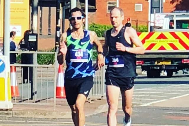 Kirk Brawn (left) during the Manchester Marathon.