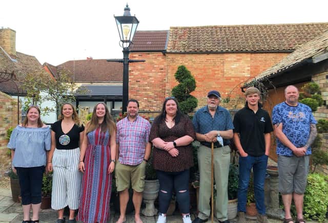 Family photo showing members of the Harbour family. Seven of those pictured in the photo will be taking part in Walk to Remember - Peterborough as 'Rosemary's Ramblers’.