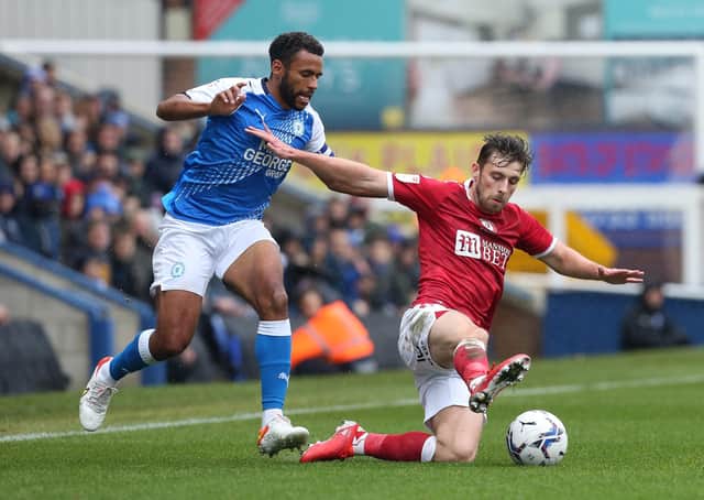 Nathan Thompson Peterborough United is tackled by Joe Williams of Bristol City on October 2. Photo: Joe Dent/theposh.com.