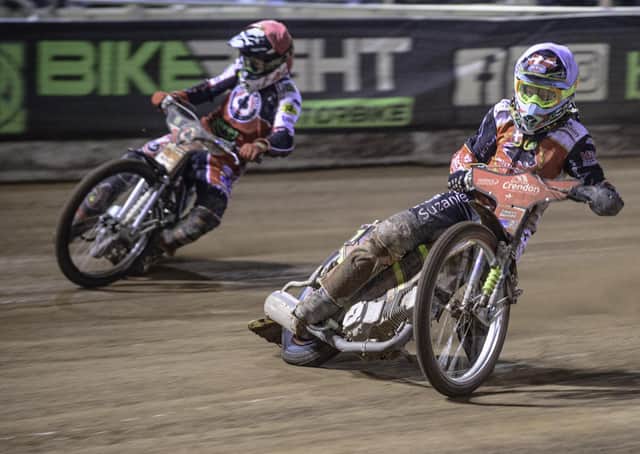 Panthers star Michael Palm Toft leads Dan Bewley of Belle Vue in the first leg of the Premiership Grand FInal. Photo: Ian Charles/MI News.