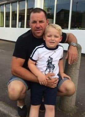 Alfie pictured with his dad Jason
