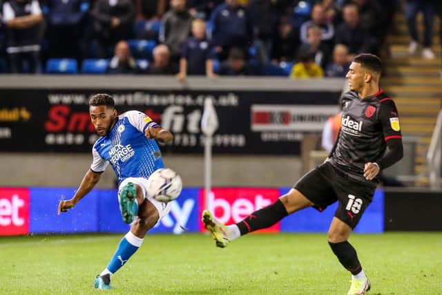 Posh star Nathan Thompson (left) has been fearless in the Championship.