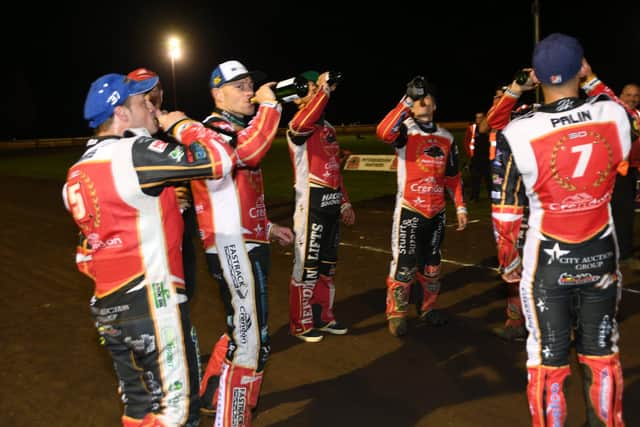 Panthers riders toast their Grand Final victory. Photo: David Lowndes.