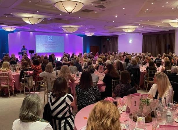 Around 250 ladies listen to Breastcare Nurse Specialist Claire Hall at the
annual fund-raising lunch.