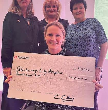 Celebrity guest Claire Lomas MBE holds a cheque for £14,200 to support
breast cancer services in Peterborough. She is joined by (left to right) event organisers Christine Brown and Carol Collier and Claire Hall of the Breast Care Unit at Peterborough City Hospital.