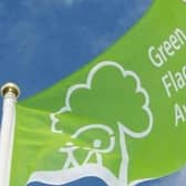 The Green Flag flies above Central Park in Peterborough.