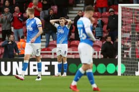 Jack Taylor of Peterborough United cuts a dejected figure after Middlesbrough score the opening goal. Photo: Joe Dent/theposh.com.