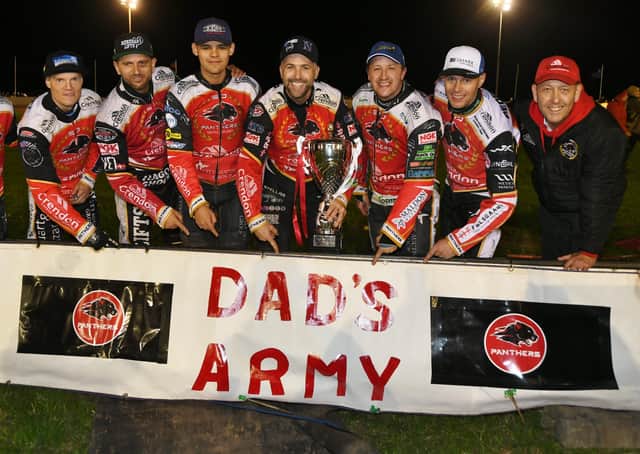 Peterborough Panthers proudly display their nickname after securing Grand Final glory. Nicholls is holding the trophy. Photo: David Lowndes.