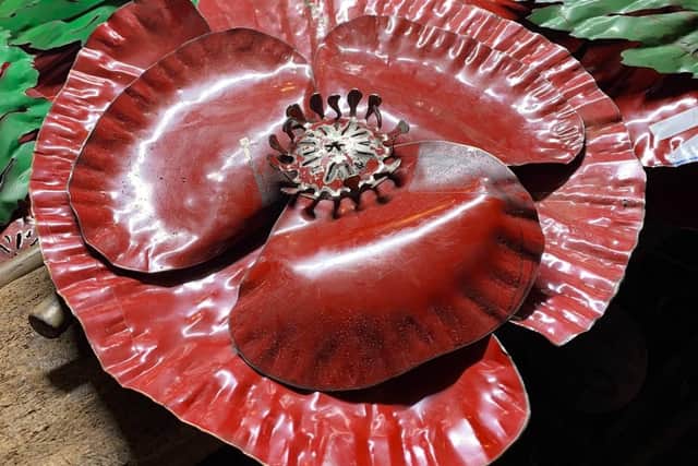 The poppy sculpture being crafted by Jeni Cairns.