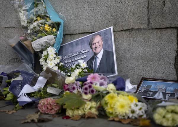 Floral tributes to Sir David Amess MP outside Parliament on October 19, 2021 (Photo by Rob Pinney/Getty Images)