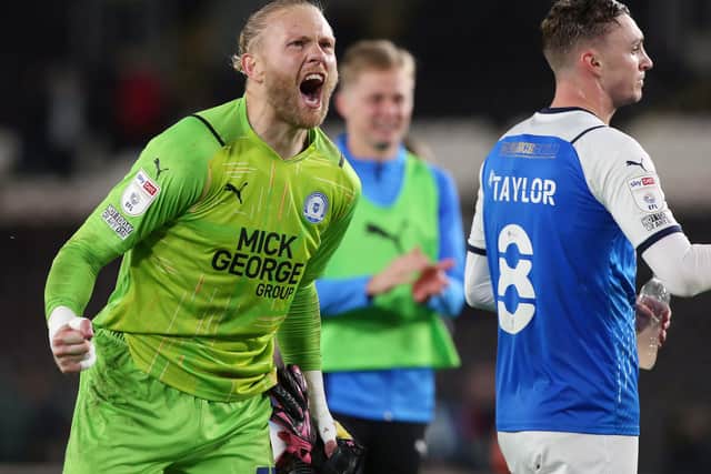 Posh goalkeeper Dai Cornell celebrates the win at Hull City. Photo: Joe Dent/theposh.com
