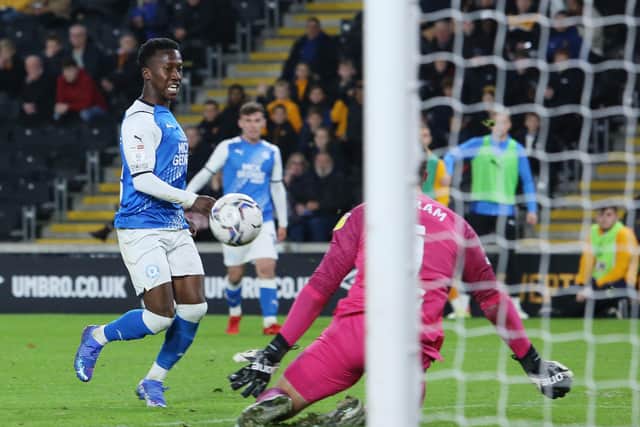 Siriki Dembele of Peterborough United scores the winning goal against Hull City. Photo: Joe Dent/theposh.com