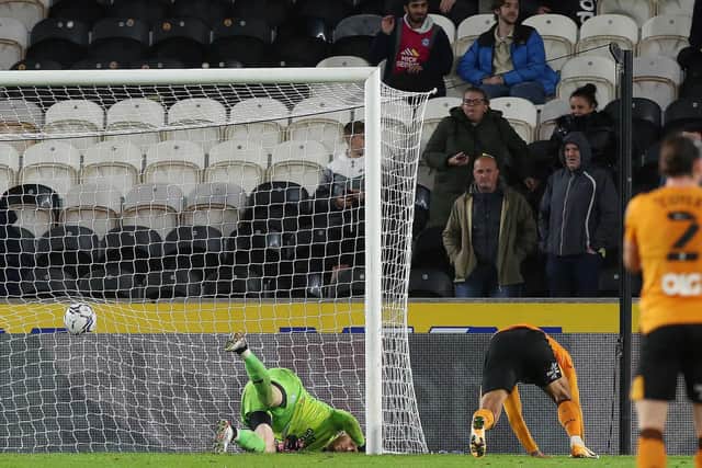 Josh Magennis of Hull City scores the equalising goal past Posh goalkeeper Dai Cornell. Photo: Joe Dent/theposh.com