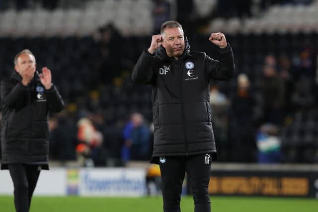 Peterborough United Manager Darren Ferguson celebrates the victory at Hull. Photo: Joe Dent/theposh.com.