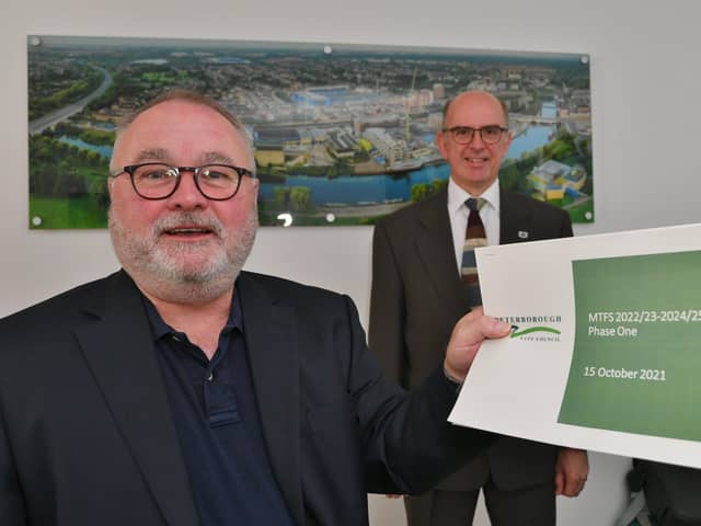 Peterborough City Council leader Wayne Fitzgerald with Cabinet member for finance Cllr Andy Coles with the council's Budget proposals. EMN-211015-134641009