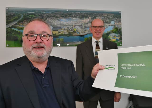 Peterborough City Council leader Wayne Fitzgerald with Cabinet member for finance Cllr Andy Coles with the council's Budget proposals. EMN-211015-134641009