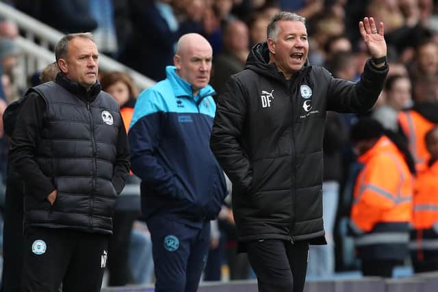 Peterborough United manager Darren Ferguson issues instructions from the touchline alongside Queens Park Rangers manager Mark Warburton. Photo: Joe Dent/theposh.com.