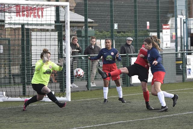 Action from Netherton United (red) v Anstey Nomads in the Women's FA Cup. Photo: David Lowndes.