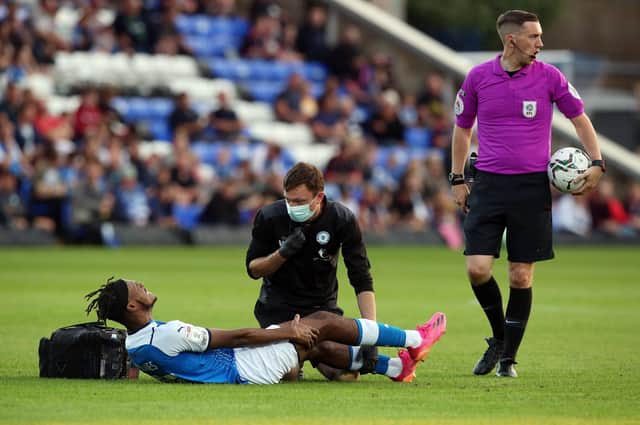 Posh striker Ricky-Jade Jones after picking up his injury against Plymouth.