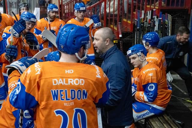 Phantoms coach Slava Koulikoc issues instructions to his players