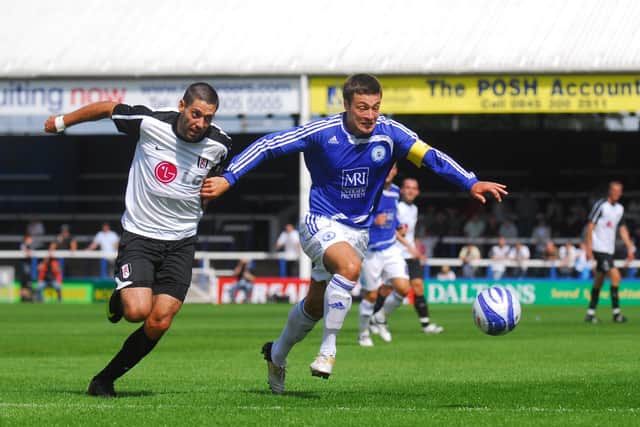 Swansea manager Russell Martin (right) in his days as a Posh player.