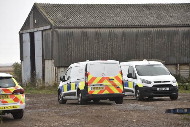 Police at the scene of a stabbing at farmyard at Fengate EMN-211029-133238009