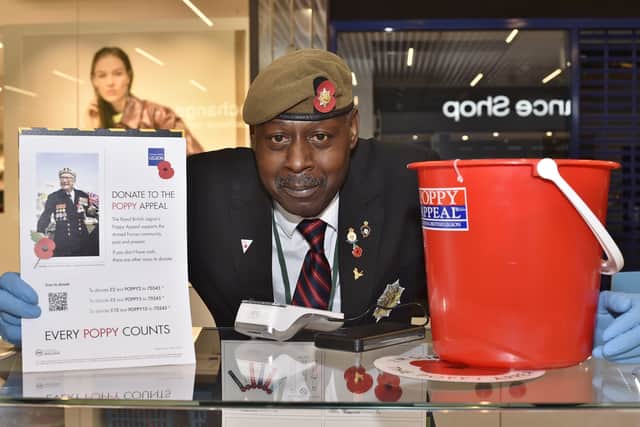 Launch of last year's Royal British Legion (Peterborough Branch)  poppy appeal. Tony Francis, the deputy appeal organiser with some of their new items EMN-201024-175342009