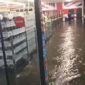 Flood waters inside Aldi at PE1 Retail Park near Eye.