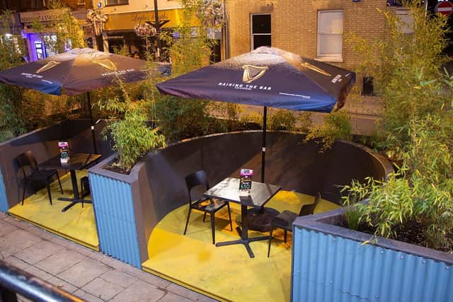 The new outdoor seating at The Banyan Tree in Westgate at night