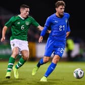 Conor Coventry (left) in action for Ireland Under 21s.