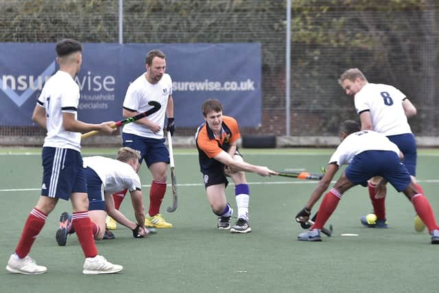 Action from City of Peterborough 2nds (white) v Cambridge City 2nds at Bretton Gate. Photo: David Lowndes.
