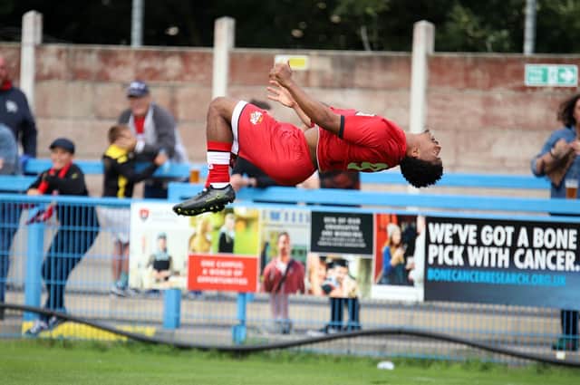 Decarrey Sheriff celebrates a goal for Kettering in style. Photo: Pete Short.