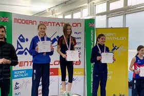 Isabella Howser (centre) on the podium in Bath.