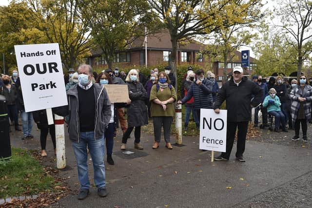 Werrington residents at a protest held last year against a fence being erected around the playing fields behind Ken Stimpson School.