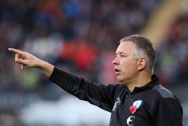 Peterborough United Manager Darren Ferguson during the painful defeat at Swansea.
