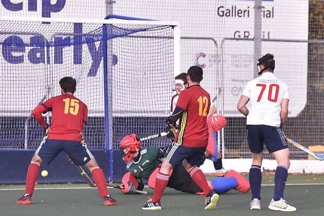 Joe Finding (not in picture) fires City of Peterborough ahead against Birmingham University. Photo: David Lowndes