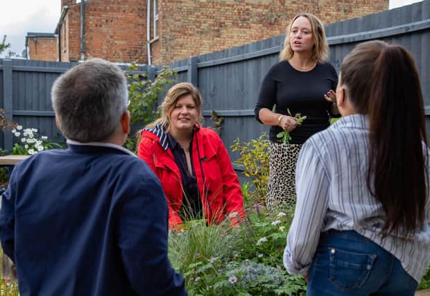Garden Creator Jeni Cairns, meeting at the Annabelle Davis centre (ADC), with  patrons Warwick and Annabelle and Vice Chair of YPCS Michelle Lay at the opening of their sensory garden during the pandemic.