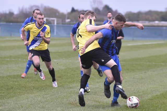 Action from Whittlesey Athletic (blue) v Worcester City in the FA Vase. Photo: David Lowndes.