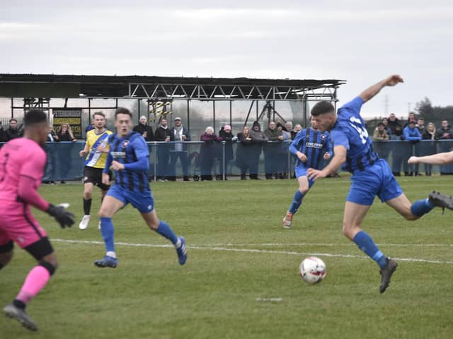 Action from Whittlesey Athletic (blue) v Worcester City in the FA Vase. Photo: David Lowndes.